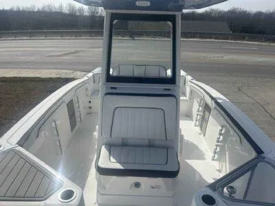 Slide: The Image of 2025 Yamaha Boats 252 FSH Sport, sleek interior view, white seating, modern design. - 11