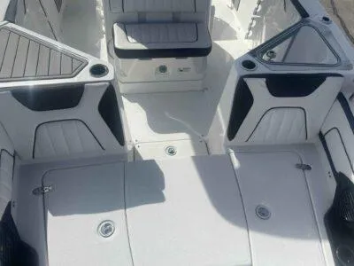 Slide: The Image of 2025 Yamaha Boats 252 FSH Sport interior, featuring sleek seating and modern design elements. - 12