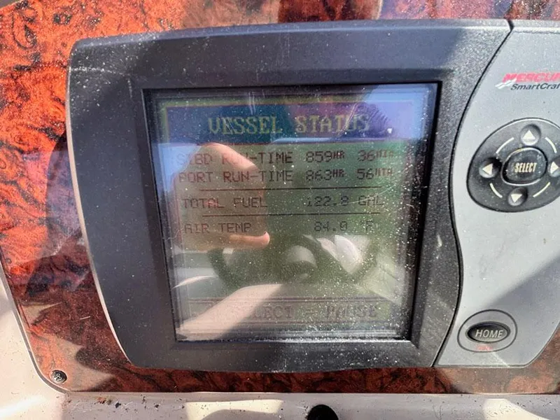 Slide: The Image of Display screen showing vessel stats on a 2006 Sea Ray 320 Sundancer. - 10