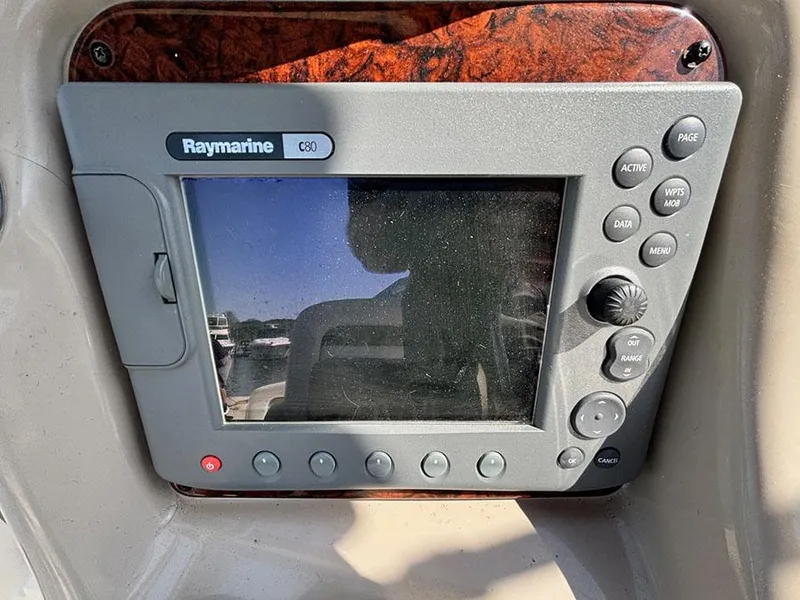 Slide: The Image of Raymarine GPS system on 2006 Sea Ray 320 Sundancer boat dashboard. - 11
