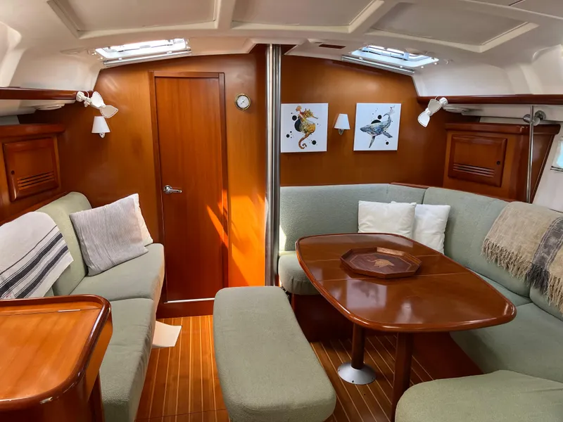Slide: The Image of Luxurious interior of 2007 Beneteau 423 yacht with elegant wood finish and comfortable seating. - 23