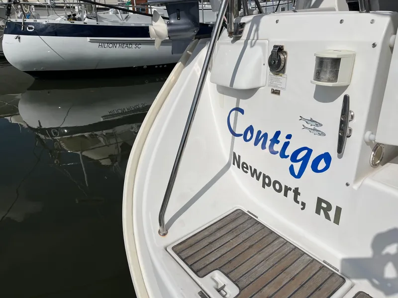 Slide: The Image of Beneteau 423 sailboat named "Contigo" docked in Newport, RI, 2007 model. - 3