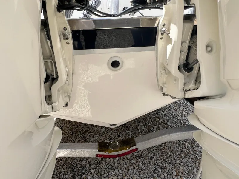 Slide: The Image of 2016 Pursuit S 280 Sport boat hull and trailer close-up. - 19