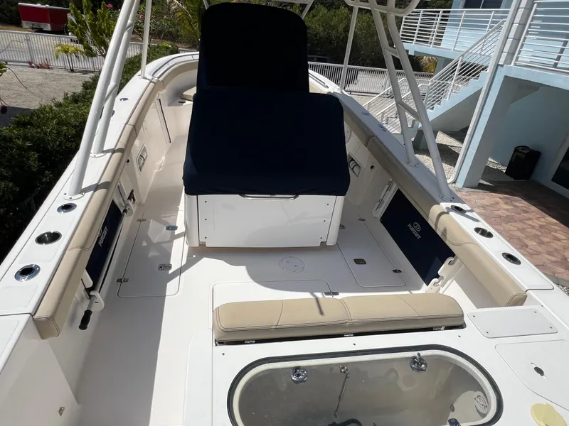 Slide: The Image of 2016 Pursuit S 280 Sport boat interior with seating and storage compartments. - 22