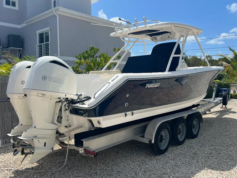 Slide: The Image of 2016 Pursuit S 280 Sport boat on trailer with dual Yamaha engines. - 6