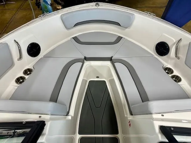 Slide: The Image of Interior view of 2025 Bayliner V20i boat, featuring sleek seating and modern design elements. - 5