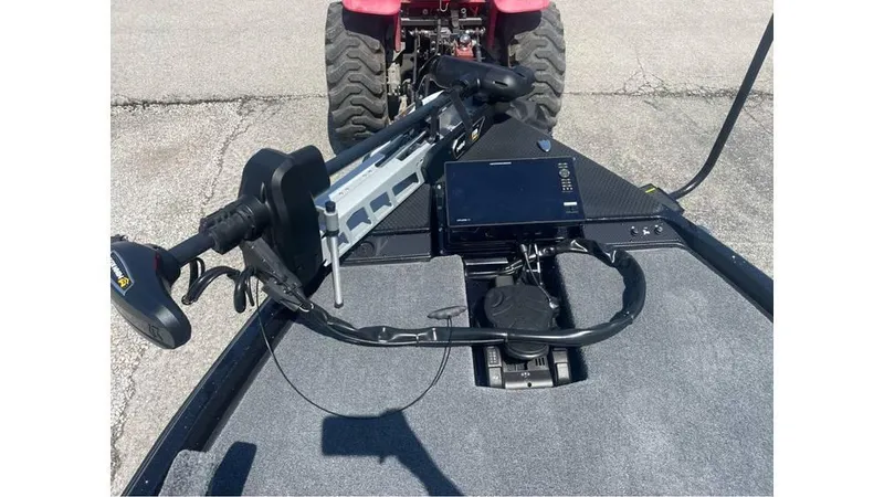 Slide: The Image of 2025 Phoenix 721 ZXL boat deck with trolling motor and control panel. - 11