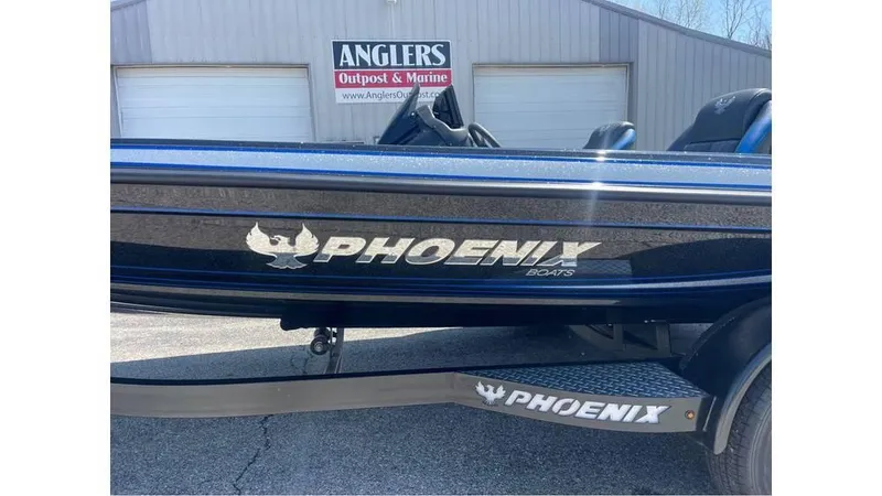 Slide: The Image of 2025 Phoenix 721 ZXL boat at Anglers Outpost & Marine dealership. - 5