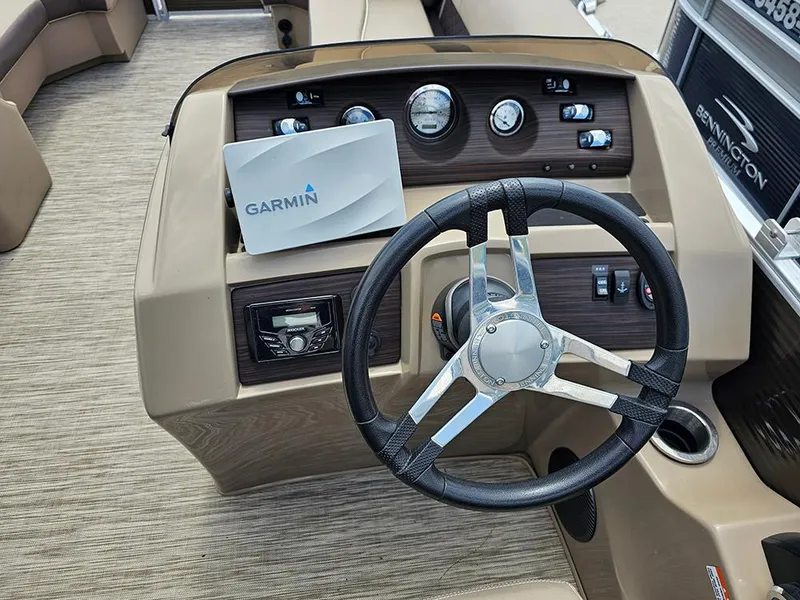 Slide: The Image of 2020 Bennington 22 SSXP boat dashboard with Garmin navigation and steering wheel. - 14