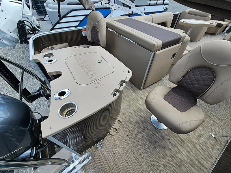 Slide: The Image of 2020 Bennington 22 SSXP pontoon boat interior with seating and control panel. - 7