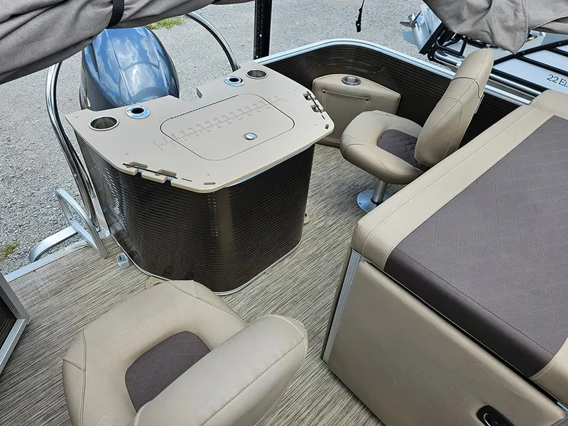 Slide: The Image of 2020 Bennington 22 SSXP boat interior with seating and control panel. - 9