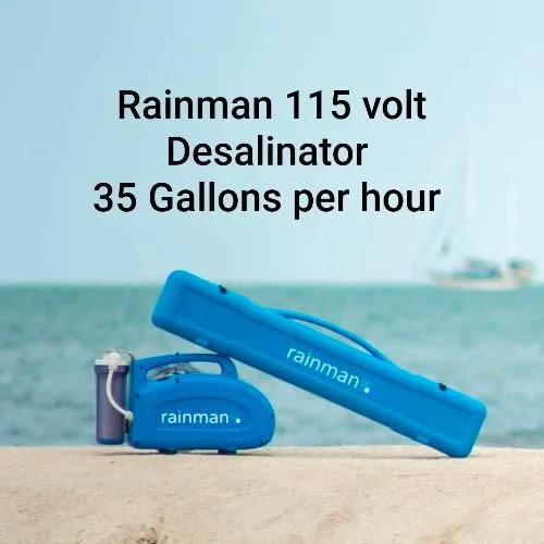 Slide: The Image of Rainman 115V desalinator on beach, produces 35 gallons/hour, with Hunter 380 sailboat in background. - 26