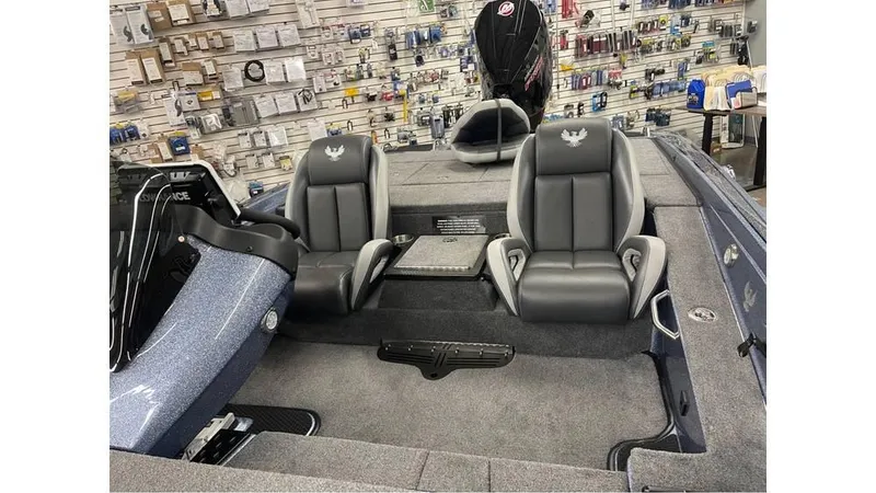 Slide: The Image of 2025 Phoenix 721 ZXL boat interior with two gray seats and a control panel. - 5
