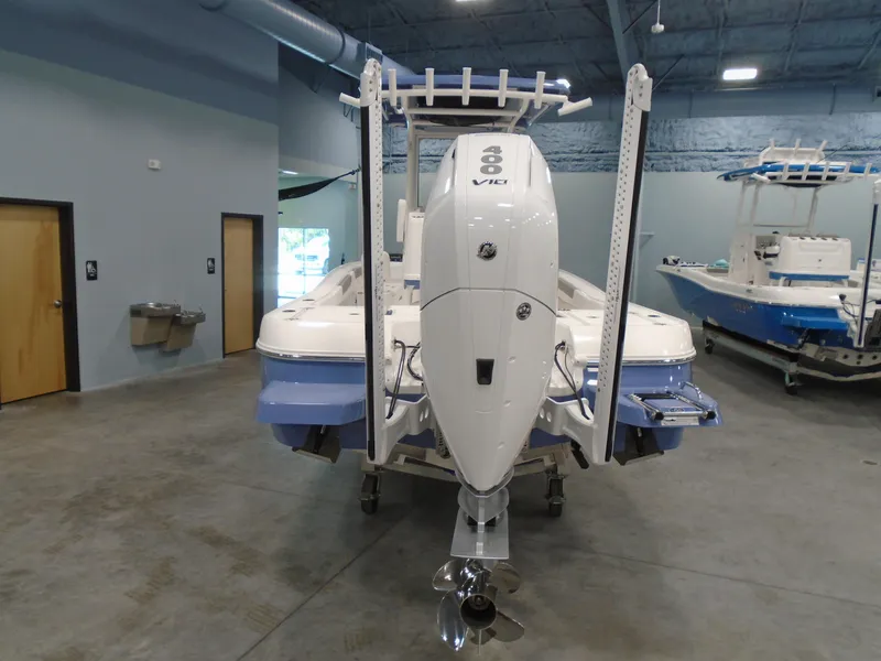 Slide: The Image of 2026 Caymas 26 HB boat console with black frame and sleek design. - 13