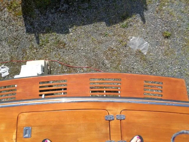 Slide: The Image of Overhead view of 1999 Albemarle 325 Convertible boat deck on gravel surface. - 31