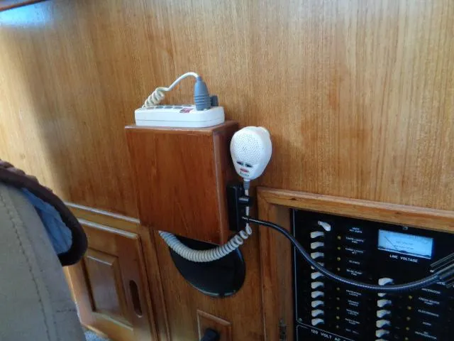 Slide: The Image of Interior of 1999 Albemarle 325 Convertible with radio and control panel. - 38