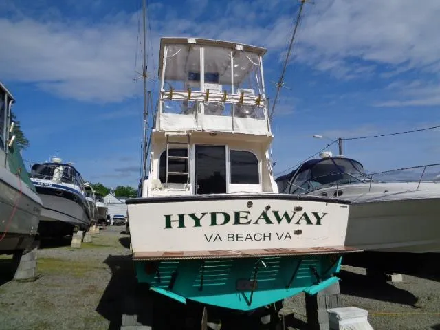 Slide: The Image of 1999 Albemarle 325 Convertible boat named "Hydeaway" in dry dock, Virginia Beach. - 4