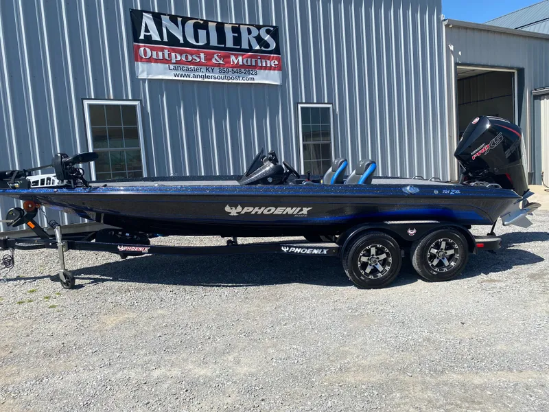 Slide: The Image of 2025 Phoenix 721 ZXL boat at Anglers Outpost & Marine dealership. - 1