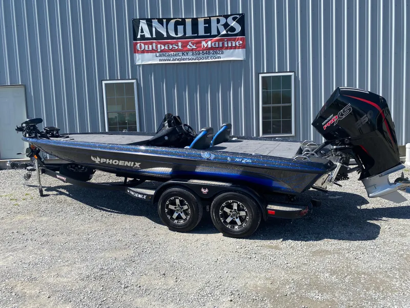 Slide: The Image of 2025 Phoenix 721 ZXL boat parked outside Anglers Outpost & Marine. - 7