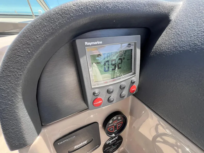 Slide: The Image of Raymarine display on 2006 Four Winns 348 Vista boat dashboard. - 27