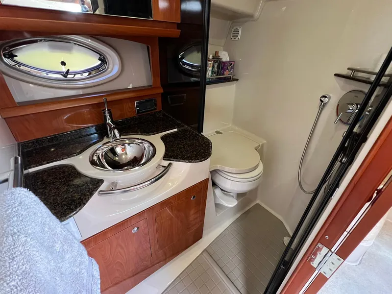 Slide: The Image of Luxurious 2006 Four Winns 348 Vista yacht bathroom with modern fixtures and elegant design. - 4