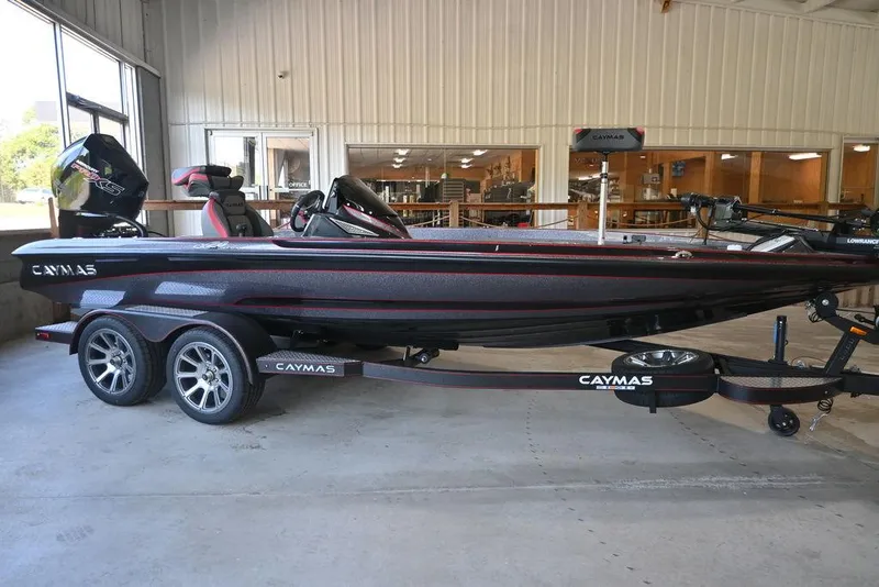 Slide: The Image of 2025 Caymas CX 20 PRO bass boat on trailer in showroom. - 0