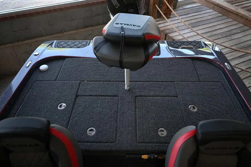 Slide: The Image of 2025 Caymas CX 20 PRO boat deck with seating and storage compartments. - 9