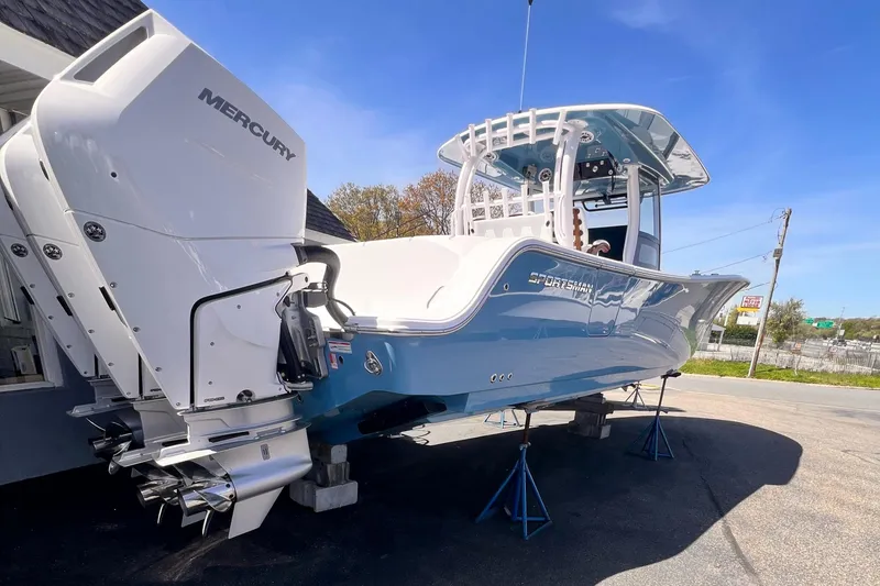 Slide: The Image of 2025 Sportsman Open 352 Center Console boat with Mercury engines on display. - 3
