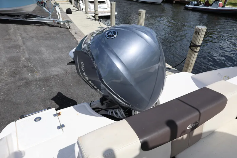 Slide: The Image of 2019 Robalo R242 Explorer boat with Yamaha outboard engine at dockside. - 24