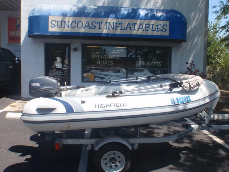 The Image of Highfield Classic 290 inflatable boat, 2021 model, on trailer outside Suncoast Inflatables store. - 0