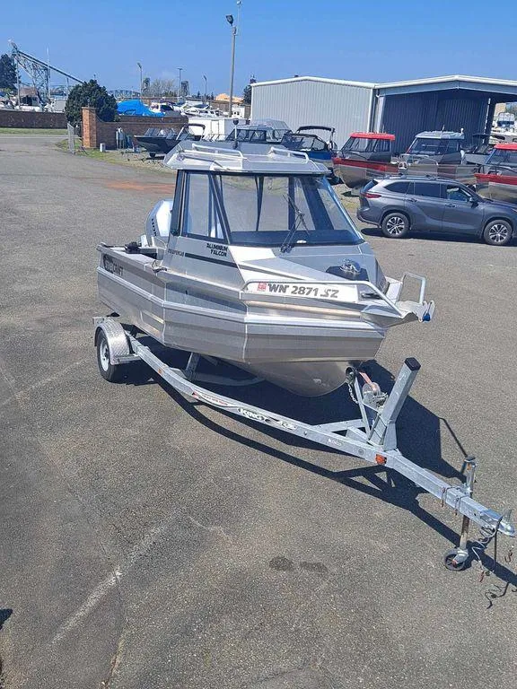 Slide: The Image of 2021 Stabicraft 1850 Supercab X1 boat on trailer in parking lot. - 2