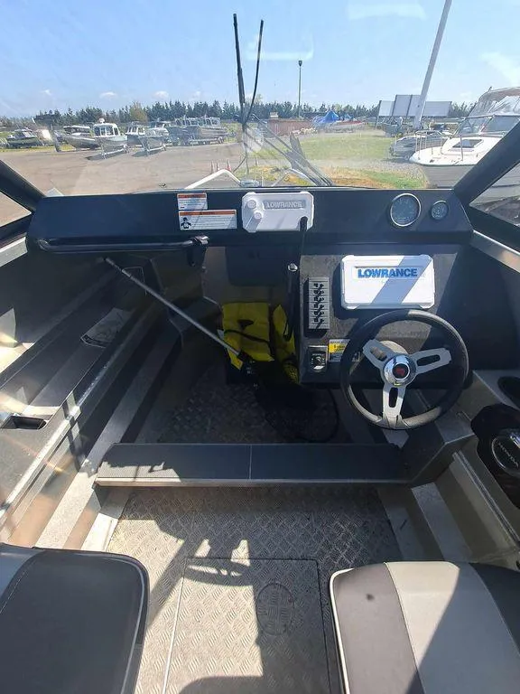 Slide: The Image of 2021 Stabicraft 1850 Supercab X1 interior with steering wheel and navigation equipment. - 7
