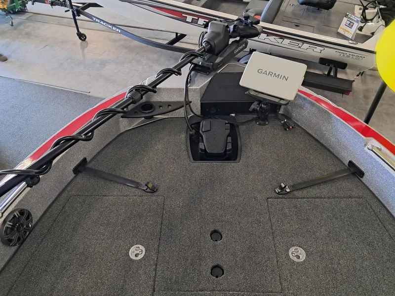 Slide: The Image of 2025 Nitro ZV2O SPT PRO boat deck with Garmin navigation system and foot pedal. - 7