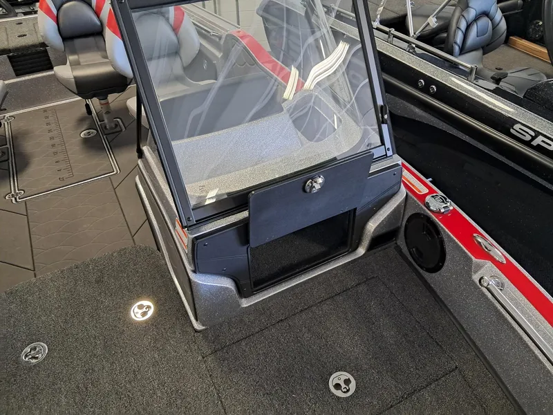 Slide: The Image of 2025 Nitro ZV2O SPT PRO boat interior with seating and dashboard details. - 8