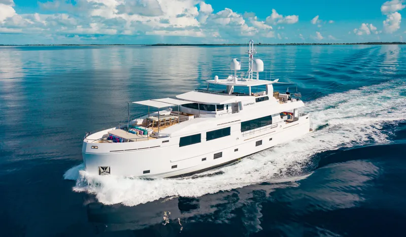 Slide: The Image of Luxurious 2017 Mengi Yay 105 Custom Explorer yacht cruising on calm ocean waters. - 0