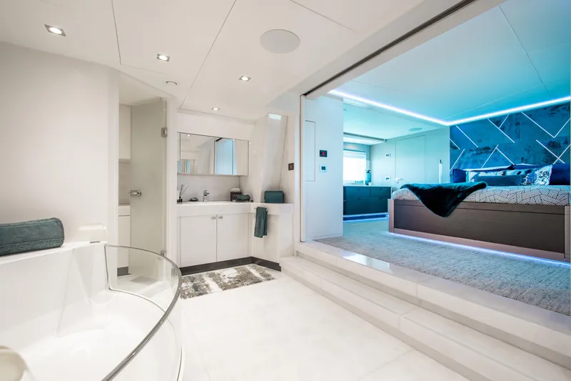 Slide: The Image of Luxurious interior of 2017 Mengi Yay 105 Custom Explorer yacht, featuring modern bedroom and bathroom. - 13
