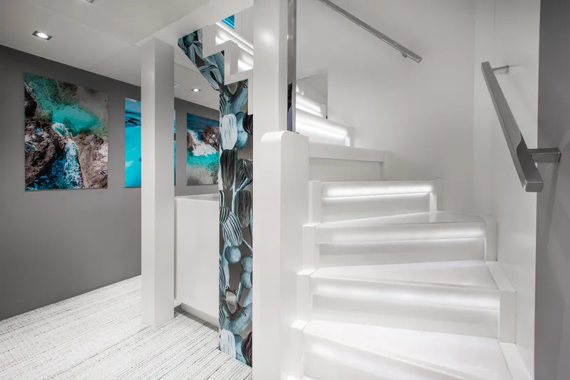 Slide: The Image of Luxurious interior of 2017 Mengi Yay 105 Custom Explorer yacht with modern staircase and artwork. - 14