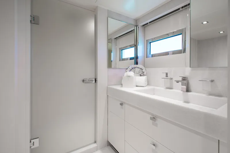 Slide: The Image of Luxurious bathroom in 2017 Mengi Yay 105 Custom Explorer yacht, featuring sleek design and modern fixtures. - 19