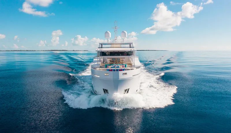 Slide: The Image of Luxury yacht "105 Mengi Yay Custom Explorer" cruising on calm ocean waters, 2017 model. - 34