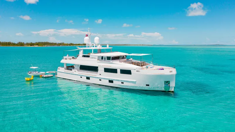 Slide: The Image of Luxurious 2017 Mengi Yay 105 Custom Explorer yacht on turquoise waters under clear skies. - 35