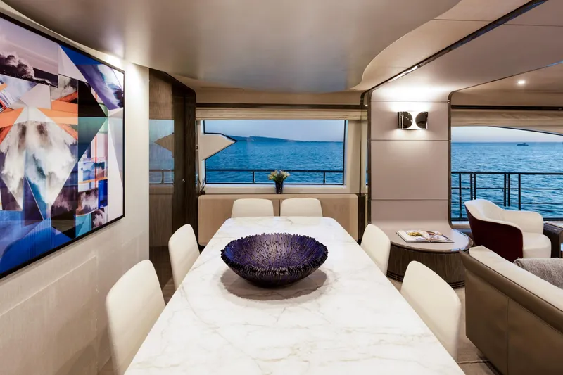 Slide: The Image of Luxurious interior of 2017 Azimut Grande 30 Metri yacht with elegant dining area and sea view. - 13