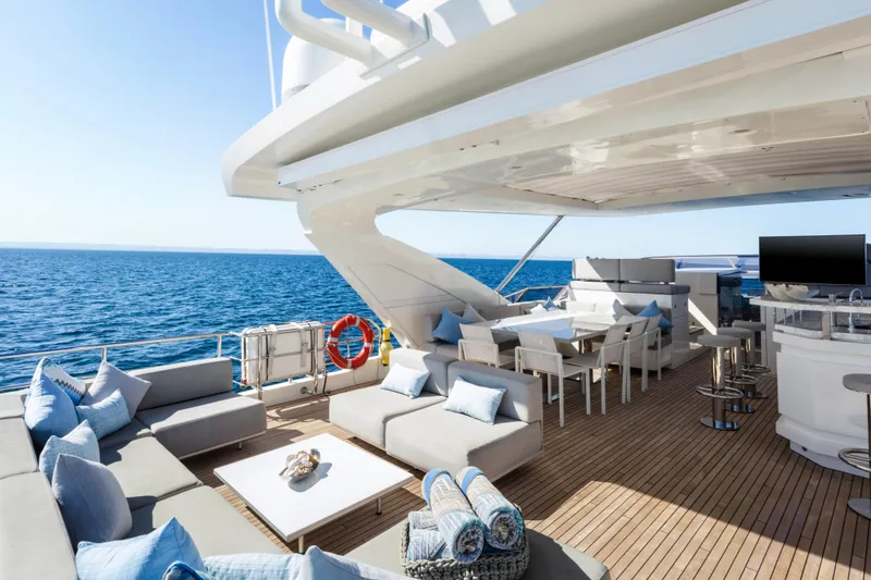 Slide: The Image of Luxurious Azimut Grande 30 Metri yacht deck with elegant seating and ocean view, 2017 model. - 24