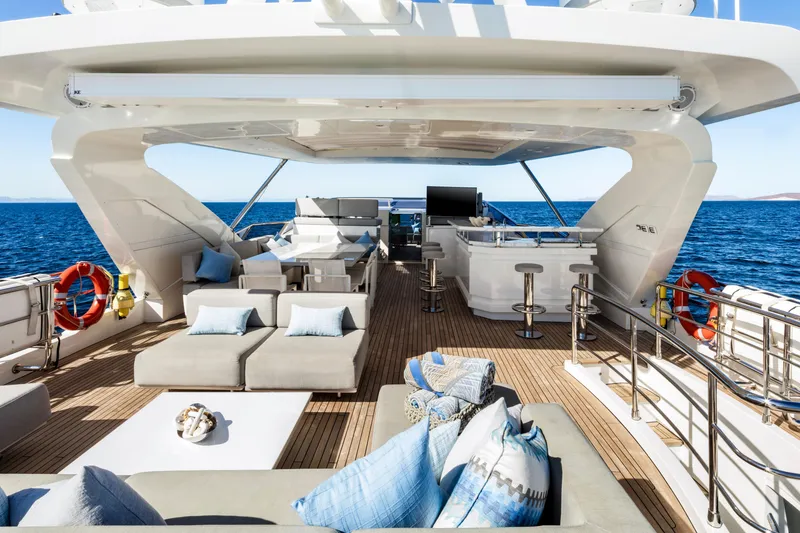 Slide: The Image of Luxurious Azimut Grande 30 Metri yacht deck with elegant seating, ocean view, and modern amenities. - 27