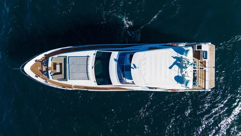 Slide: The Image of Overhead view of 2017 Azimut Grande 30 Metri yacht on open water. - 34