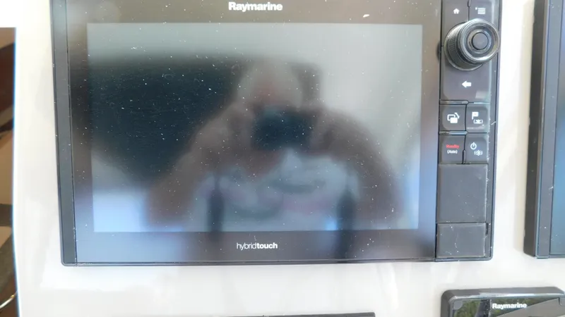 Slide: The Image of Raymarine display on 2017 Boston Whaler 315 Conquest boat, showing reflection. - 14