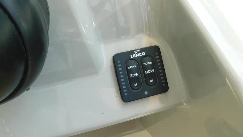 Slide: The Image of Lenco trim tab control panel on 2017 Boston Whaler 315 Conquest boat. - 18