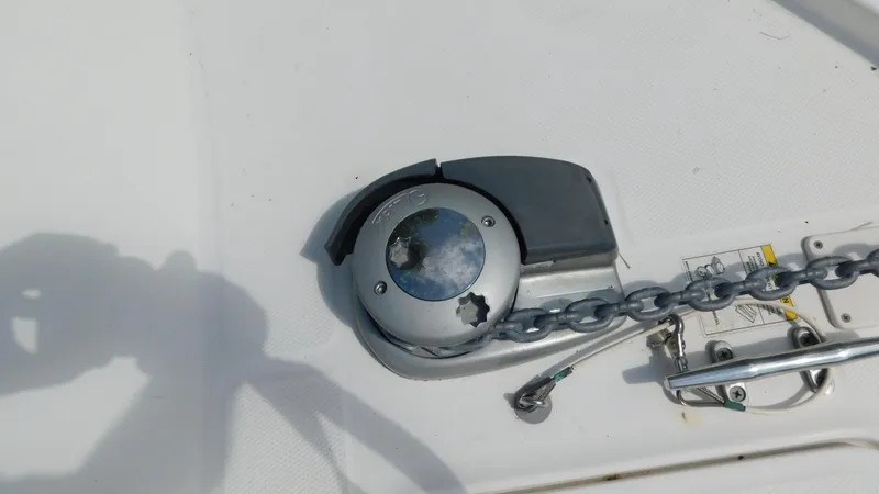 Slide: The Image of Anchor windlass on 2017 Boston Whaler 315 Conquest boat deck. - 28