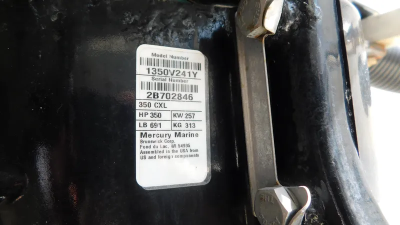 Slide: The Image of Label on a 2017 Boston Whaler 315 Conquest, displaying Mercury Marine engine specifications. - 49