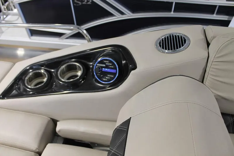 Slide: The Image of Luxurious seating and control panel on 2018 Bennington 25RSB boat. - 7