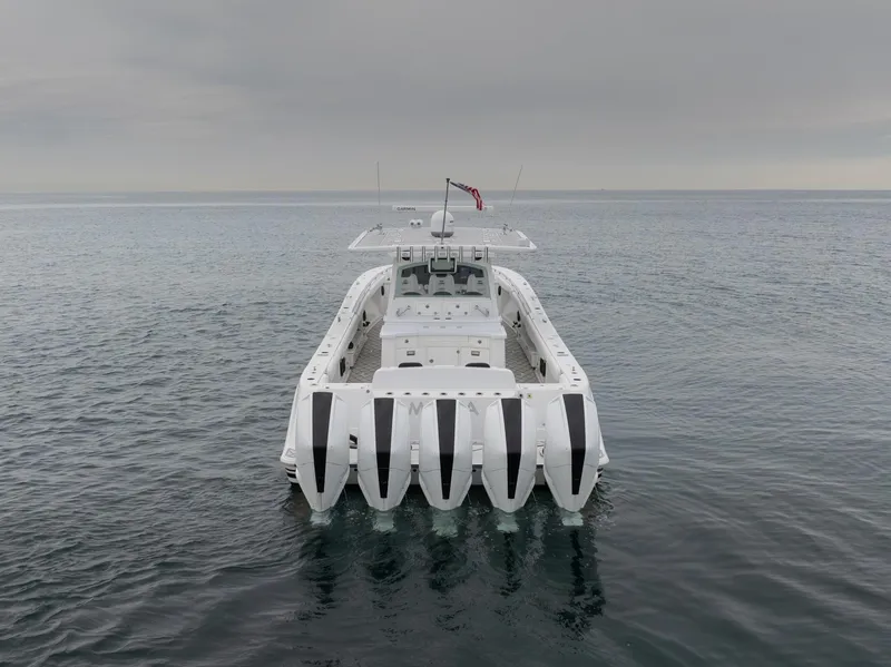 Slide: The Image of 2021 HCB Suenos boat on calm sea under overcast sky. - 8
